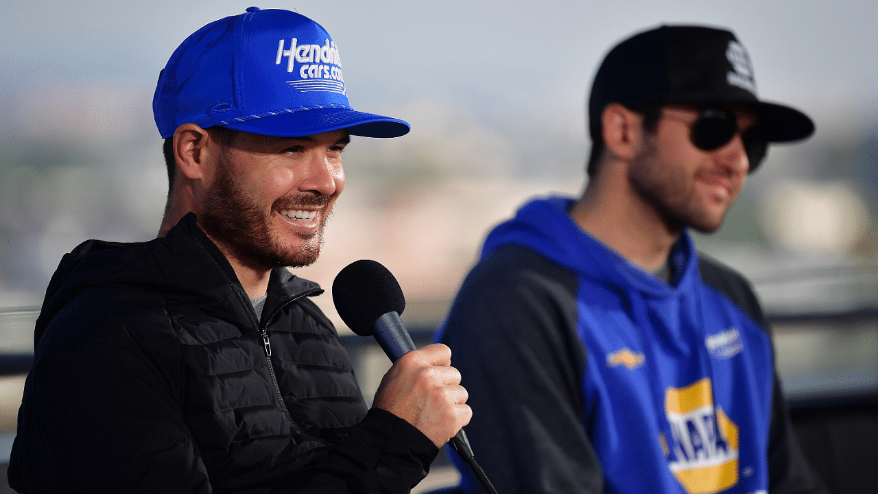 Feb 4, 2023; Los Angeles, California, USA; NASCAR Cup Series driver Kyle Larson (5) and driver Chase Elliott (9) during media availabilities at Los Angeles Memorial Coliseum. Mandatory Credit: Gary A. Vasquez-Imagn Images