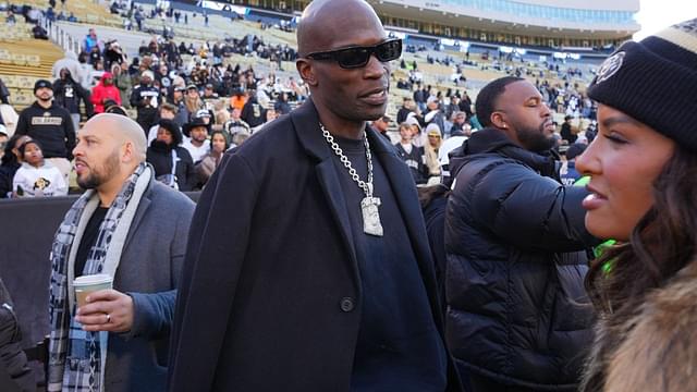 Retired American football player Chad Johnson on the sidelines before the game between the Utah Utes against the Colorado Buffaloes at Folsom Field.