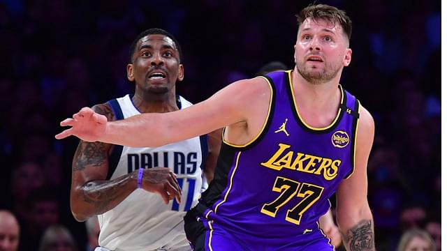 Los Angeles Lakers guard Luka Doncic (77) and Dallas Mavericks guard Kyrie Irving (11) attempt to gain control during the first quarter at Crypto.com Arena.