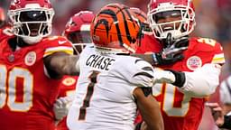 Cincinnati Bengals wide receiver Ja'Marr Chase (1) and Kansas City Chiefs safety Justin Reid (20) exchange shoves in the second quarter during a Week 17 NFL football game between the Cincinnati Bengals and the Kansas City Chiefs, Sunday, Dec. 31, 2023, at GEHA Field at Arrowhead Stadium in Kansas City, Mo.