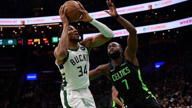 Milwaukee Bucks forward Giannis Antetokounmpo (34) drive to the basket while Boston Celtics guard Jaylen Brown (7) defends during the first half at TD Garden.