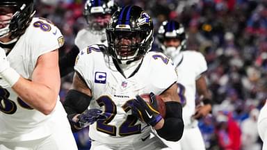 Jan 19, 2025; Orchard Park, New York, USA; Baltimore Ravens running back Derrick Henry (22) runs the ball during the third quarter against the Buffalo Bills in a 2025 AFC divisional round game at Highmark Stadium.