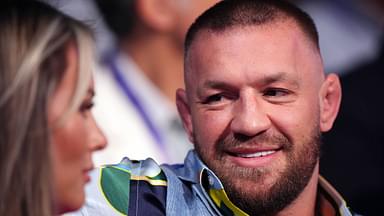 Conor McGregor and Dee Devlin in the stands at Wembley Stadium, London.