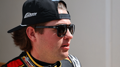 Feb 16, 2025; Daytona Beach, Florida, USA; NASCAR Cup Series driver Noah Gragson(4) walks to the drivers meeting before the Daytona 500 at Daytona International Speedway. Mandatory Credit: Peter Casey-Imagn Images