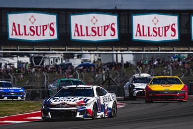 Busch Light Chevrolet driver Ross Chastain (1) leads a group of cars throught turn 16 during the NASCAR Cup Series EchoPark Automotive Grand Prix at Circuit of the Americas on Sunday, March 2, 2025 in Austin.