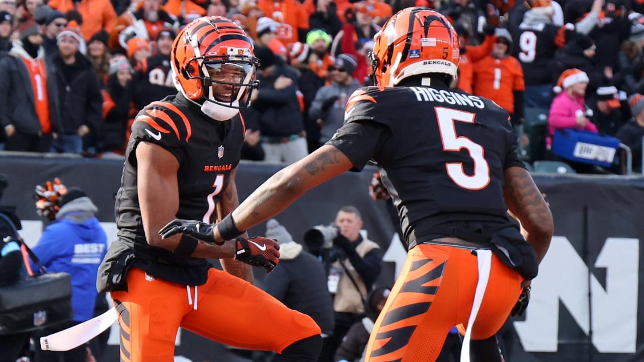 Dec 22, 2024; Cincinnati, Ohio, USA; Cincinnati Bengals wide receiver Ja'Marr Chase (1) celebrates a touchdown with wide receiver Tee Higgins (5) during the first quarter against the Cleveland Browns at Paycor Stadium.