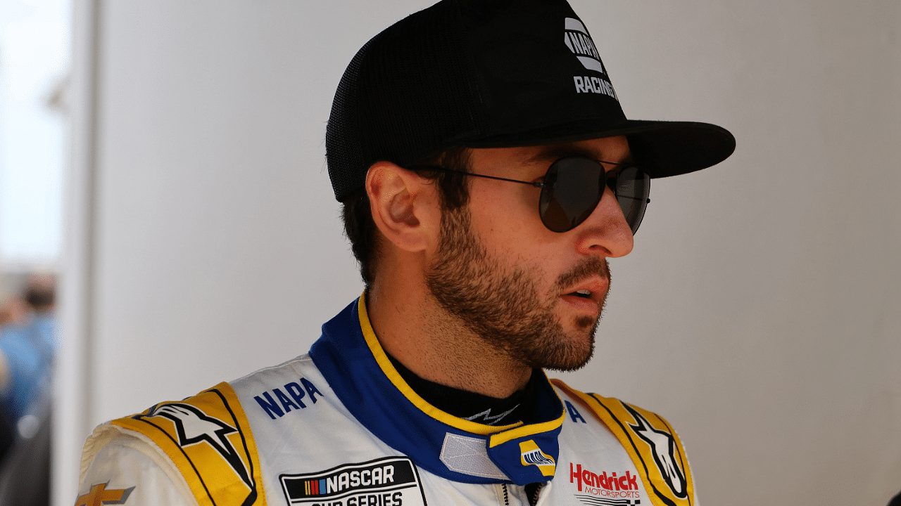 Feb 16, 2025; Daytona Beach, Florida, USA; NASCAR Cup Series driver Chase Elliott (9) walks to the drivers meeting before the Daytona 500 at Daytona International Speedway. Mandatory Credit: Peter Casey-Imagn Images