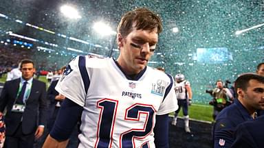 Minneapolis, MN, USA; Confetti falls as New England Patriots quarterback Tom Brady (12) walks off the field after Super Bowl LII against the Philadelphia Eagles at U.S. Bank Stadium.