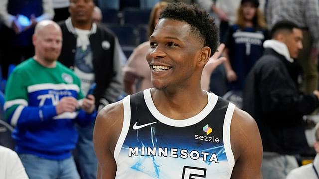 Minnesota Timberwolves guard Anthony Edwards (5) smiles after the game against the Brooklyn Nets at Target Center.
