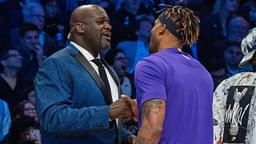 NBA great Shaquille O'Neal (left) shakes hands with Los Angeles Lakers player Dwight Howard (right) during NBA All Star Saturday Night at United Center.