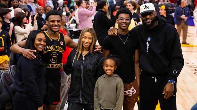 West guard Bronny James (6) poses for a family photo with grandmother Gloria Marie James, mother Savannah James , brother Bryce Maximus James, sister Zhuri Nova James and father LeBron James following the McDonald's All American Boy's high school basketball game at Toyota Center.
