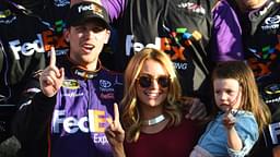 Denny Hamlin (11) reacts with Jordan Fish in victory lane after winning the Daytona 500 at Daytona International Speedway.