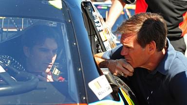 Jeff Gordon talks with former crew chief Ray Evernham (right) during practice for the Daytona 500 at Daytona International Speedway.