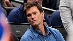 Nov 27, 2024; Dallas, Texas, USA; Former NFL quarterback Tom Brady watches the game between the Dallas Mavericks and the New York Knicks during the second quarter at the American Airlines Center.