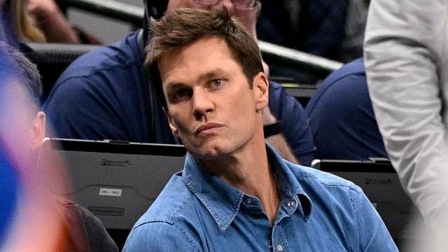 Nov 27, 2024; Dallas, Texas, USA; Former NFL quarterback Tom Brady watches the game between the Dallas Mavericks and the New York Knicks during the second quarter at the American Airlines Center.