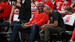 Former Houston Rockets Hakeem Olajuwon (left) sits courts side during the game between the Houston Cougars and the Memphis Tigers at Fertitta Center.