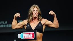 Kayla Harrison steps on the scale for the ceremonial weigh-ins at the Salt Palace Convention Center for UFC307