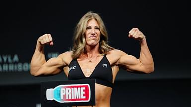 Kayla Harrison steps on the scale for the ceremonial weigh-ins at the Salt Palace Convention Center for UFC307