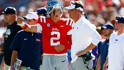 Mississippi Rebels quarterback Jaxson Dart (2) talks with Mississippi Rebels head coach Lane Kiffin during the first half against the Middle Tennessee Blue Raiders at Vaught-Hemingway Stadium.