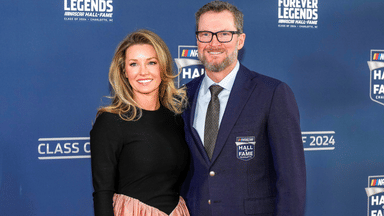 Jan 19, 2024; Charlotte, NC, USA; Dale Earnhardt Jr. and his wife Amy during the red carpet at Charlotte Convention Center Crown Ballroom. Mandatory Credit: Jim Dedmon-Imagn Images