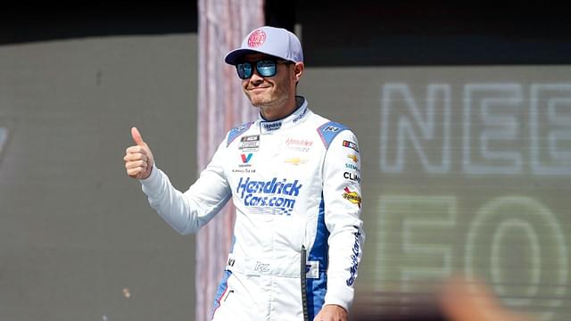 Kyle Larson (5) walks out onto the stage for driver introductions before the EchoPark Automotive Grand Prix at Circuit of the Americas.