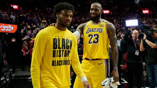 Los Angeles Lakers forward LeBron James (23) celebrates victory over the Portland Trail Blazers with his son guard Bronny James (9) at Moda Center.