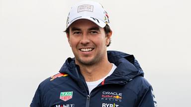 F1 Las Vegas Grand Prix; FP3 and Qualifying Day; Sergio Perez (11) of Mexico and team Oracle Red Bull Racing walks in the paddock