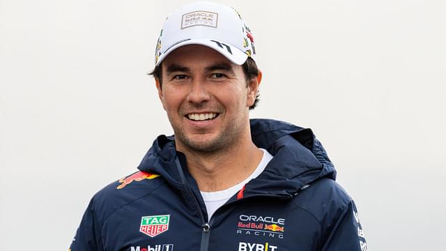 F1 Las Vegas Grand Prix; FP3 and Qualifying Day; Sergio Perez (11) of Mexico and team Oracle Red Bull Racing walks in the paddock