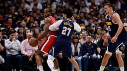 Los Angeles Clippers forward Kawhi Leonard (2) controls the ball as Denver Nuggets guard Jamal Murray (27) guards and center Nikola Jokic (15) defends in the third quarter during game two of first round for the 2025 NBA Playoffs at Ball Arena.