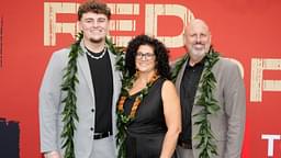 Michigan Wolverines defensive lineman Mason Graham with his parents Allen Graham and Kimberly Graham on the red carpet before the 2025 NFL Draft at Lambeau Field.