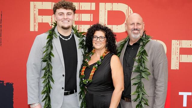 Michigan Wolverines defensive lineman Mason Graham with his parents Allen Graham and Kimberly Graham on the red carpet before the 2025 NFL Draft at Lambeau Field.