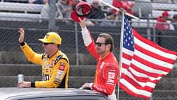 Kyle Busch and Kurt Busch wave to the fans in attendance prior to the 2022 Goodyear 400 at Darlington Raceway.
