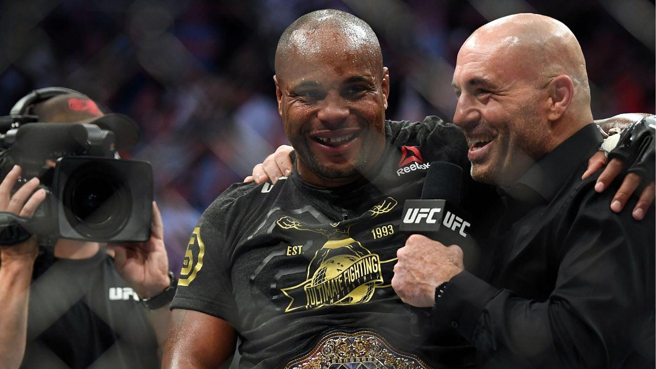 Daniel Cormier (blue gloves) celebrates beating Stipe Miocic (red gloves) during UFC 226 at T-Mobile Arena.