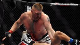 Brock Lesnar (top) of the USA holds down Frank Mir of the USA