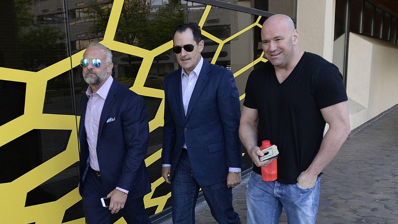 From left , UFC executives Lorenzo Fertitta, Lawrence Epstein, and Dana White, walk out of the offices of Vincent Ward,, n Downtown Albuquerque on a fact finding trip to investigate the incident involving UFC Champion Jon Jones