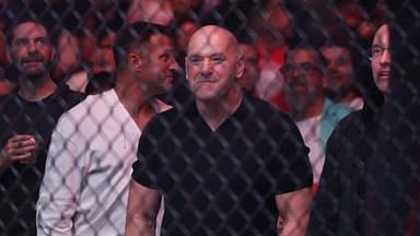 UFC CEO Dana White watches the fight between Cub Swanson (red gloves) and Billy Quarantillo (blue gloves) at Amalie Arena.