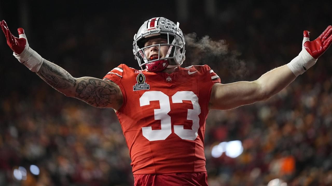 Ohio State Buckeyes defensive end Jack Sawyer (33) celebrates a sack of Tennessee Volunteers quarterback Nico Iamaleava (8) during the first half of the College Football Playoff first round game at Ohio Stadium in Columbus on Dec. 21, 2024.