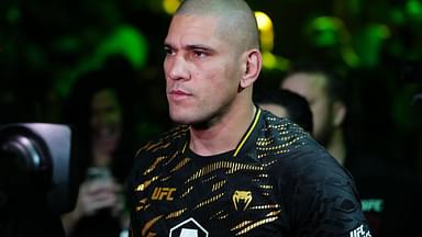 Alex Pereira (red gloves) prepares to fight Magomed Ankalaev (not pictured) during UFC 313 at T-Mobile Arena.