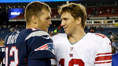 New England Patriots quarterback Tom Brady (12) and New York Giants quarterback Eli Manning (10) meet on the field after the game Gillette Stadium. The Patriots defeated the Giants 28-20.