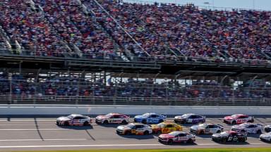 NASCAR Cup Series driver Ross Chastain (1) leads going into turn one at Talladega Superspeedway.