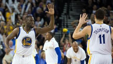 Mar 3, 2016; Oakland, CA, USA; Golden State Warriors forward Draymond Green (23) high fives guard Klay Thompson (11) after a play against the Oklahoma City Thunder during the fourth quarter at Oracle Arena. The Golden State Warriors defeated the Oklahoma City Thunder 121-106. Mandatory Credit: Kelley L Cox-Imagn Images