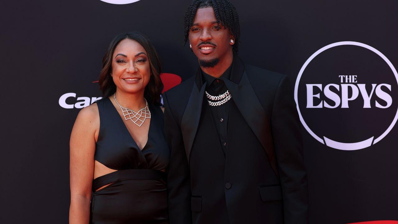 Washington Commanders quarterback Jayden Daniels and his mother Regina Jackson arrive on the red carpet before the 2024 ESPYS at Dolby Theatre.