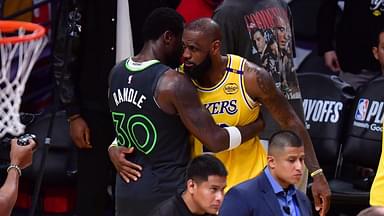 Minnesota Timberwolves forward Julius Randle (30) meets with Los Angeles Lakers forward LeBron James (23) following game five of first round for the 2025 NBA Playoffs at Crypto.com Arena