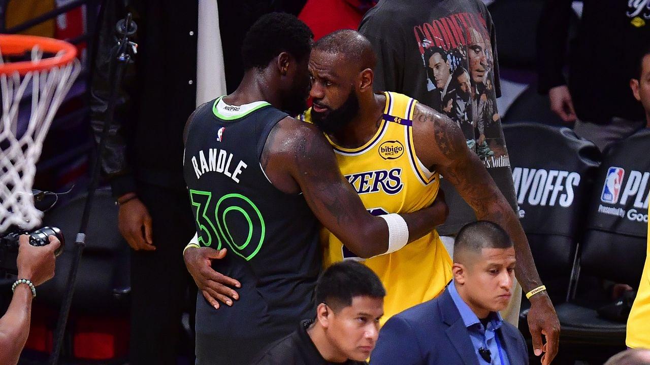 Minnesota Timberwolves forward Julius Randle (30) meets with Los Angeles Lakers forward LeBron James (23) following game five of first round for the 2025 NBA Playoffs at Crypto.com Arena