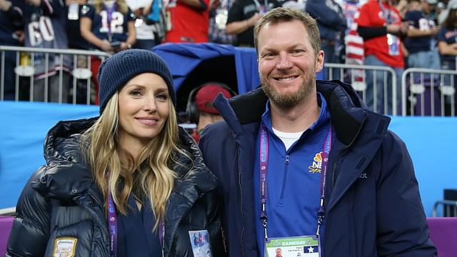NASCAR retired driver Dale Earnhardt, Jr. and wife Amy Reimann in attendance before Super Bowl LII between the Philadelphia Eagles and the New England Patriots at U.S. Bank Stadium.