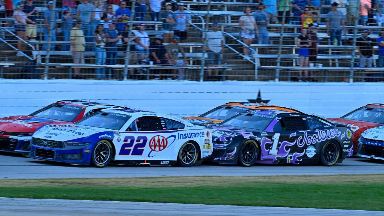 NASCAR Cup Series driver Kyle Larson (5) and driver Joey Logano (22) and driver Ross Chastain (1) and driver Ricky Stenhouse Jr. (47) drives during a restart of the Wurth 400 race at Texas Motor Speedway.