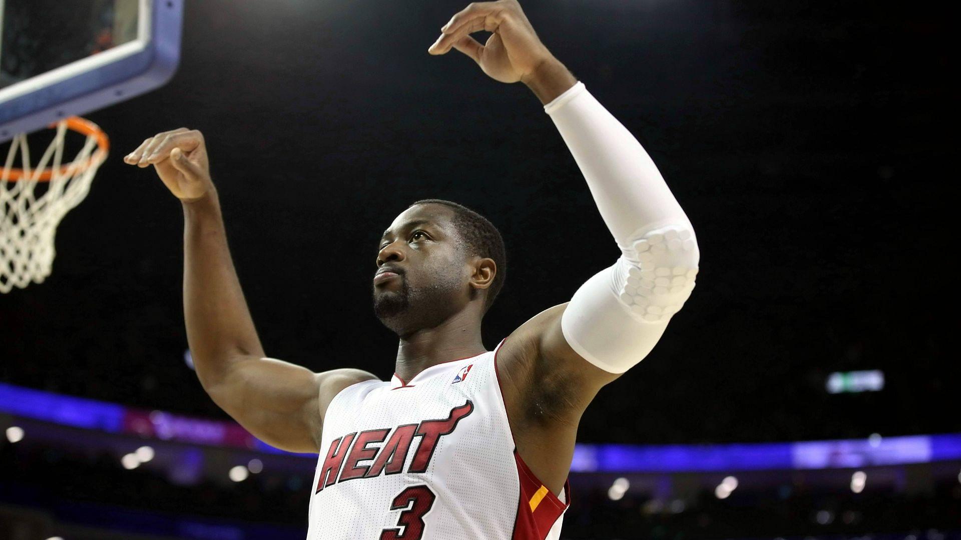 Dwyane Wade of the Miami Heat gestures as he and his teammate compete against the Los Angeles Clippers during their second match of their NBA Basketball Herren USA China Games in Shanghai, China, 14 October 2012.