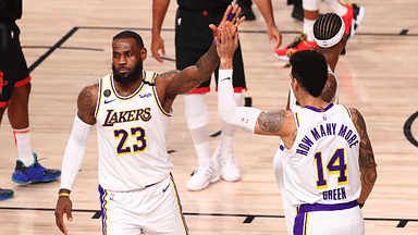 Los Angeles Lakers forward LeBron James (23) celebrates with guard Danny Green