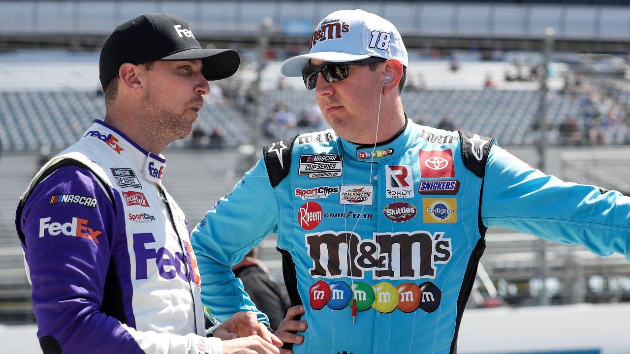 Kyle Busch (right) talks with driver Denny Hamlin (left) on pit road during qualifying for the DuraMAX Drydene 400 at Dover Motor Speedway.