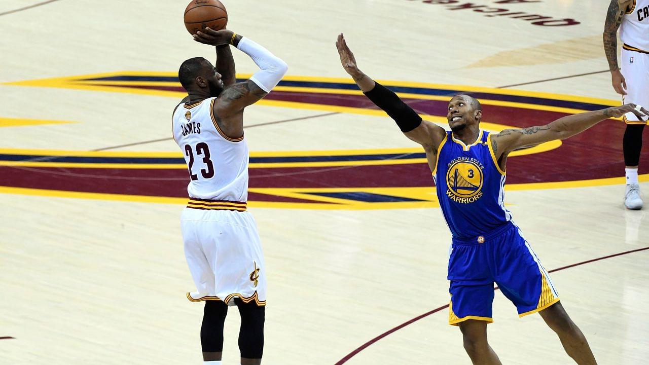 Cleveland Cavaliers forward LeBron James (23) shoots the ball against Golden State Warriors forward David West (3) during the second quarter in game three of the 2017 NBA Finals at Quicken Loans Arena.